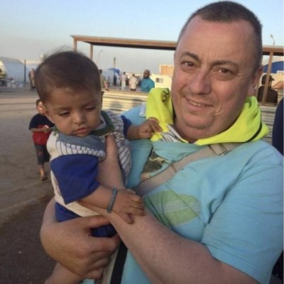 An undated family handout photo of British aid worker Alan Henning taken at a refugee camp on the Turkish-Syria border. REUTERS/Henning family handout via the British Foreign and Commonwealth Office/Handout via Reuters