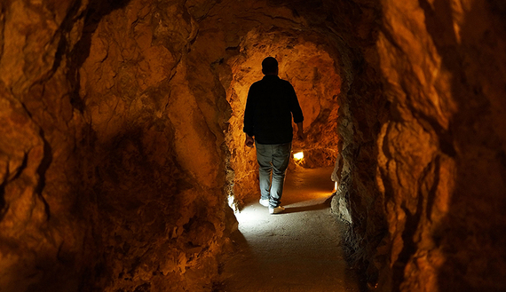 A man in Mleeta , south Lebanon walks in a tunnel in an underground bunker at the Resistance Museum, a showcase built by Hezbollah, Nov. 14, 2013. (photo by Spencer Platt/Getty Images)