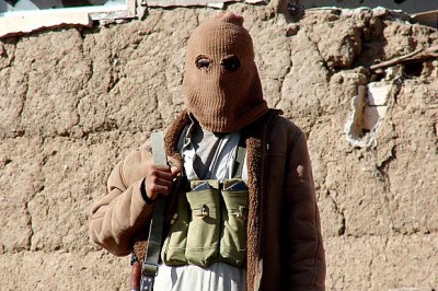Masked Yemeni houthi rebel . Yemeni President Abed Rabbu Mansour Hadi had repeatedly accused Iran and Hezbollah of aiding and training the Houthi rebels