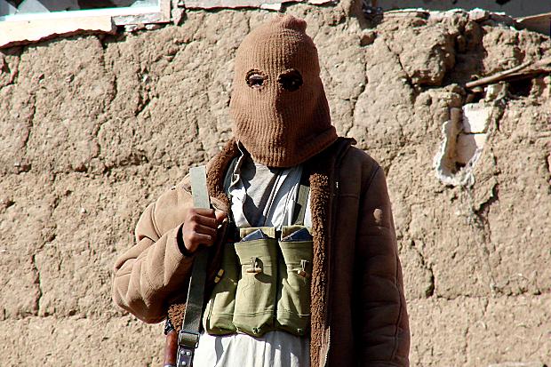 Masked Yemeni houthi rebel . Yemeni President Abed Rabbu Mansour Hadi had repeatedly accused Iran and its proxy Hezbollah of aiding and training the Houthi rebels