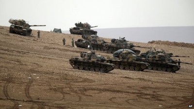 Turkish soldiers are positioned along the Turkey-Syria border but have not entered Syria 