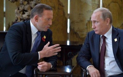 Russian President Vladimir Putin (R) speaks with Australia's Prime Minister Tony Abbott before the Asia-Pacific Economic Cooperation (APEC) Summit Photo: AFP/Getty Images