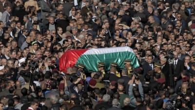 Thousands of residents from the West Bank and Jerusalem, as well as foreign dignitaries and Palestinian President Mahmoud Abbas, attended the state funeral Thursday of Ziad Abu Ein, a senior Palestinian Authority official who died during a confrontation with Israeli soldiers.