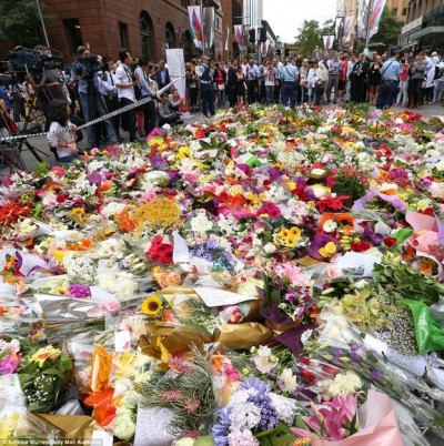 As Australia mourned the dead, thousands of people gathered at Martin Place to lay flowers 