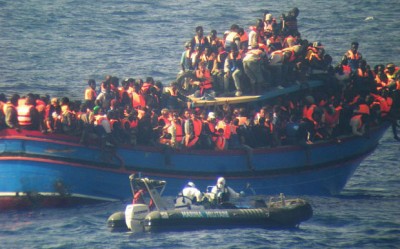 A crowded boat of immigrants during one of the rescue operations off the coast of Sicily in this picture, released by the Italian navy on June 30, 2014 Photo: AFP/GETTY IMAGES