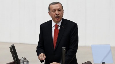 Turkey's President Tayyip Erdogan addresses the Turkish Parliament during a debate marking the reconvene of the parliament in Ankara