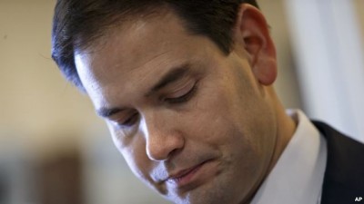 U.S. Senator Marco Rubio, a Florida Republican and son of Cuban immigrants, prepares for a Washington news conference in which he expresses disapproval of a plan to normalize relations with the island nation, Dec. 17, 2014.
