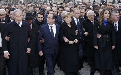 World leaders and dignitaries, including Israeli Prime Minister Benjamin Netanyahu, second from left, French President François Hollande, center, German Chancellor Angela Merkel and Palestinian Authority President Mahmoud Abbas, right, attend a unity rally Sunday in the wake of last week's attacks in Paris. (Dan Kitwood/Getty Images)