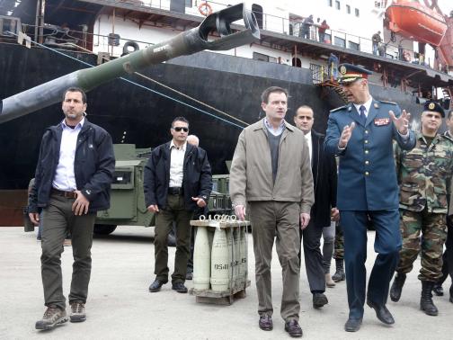 Lebanese Brigadier General Manuel Kirejian (2nd R) chats with U.S. ambassador to Lebanon David Hale (C) as they review weapons donated by the U.S. government to the Lebanese army during a ceremony at Beirut's port February 8, 2015.  REUTERS/Mohamed Azakir