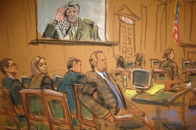 The late Palestinian leader Yasser Arafat is projected to a screen during the plaintiff's opening statements in a court sketch from January 13. PHOTO: REUTERS