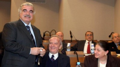 In this Feb. 14, 2005, file photo, former Lebanese Prime Minister Rafik Hariri, from left, stands next of lawmaker Marwan Hamadeh and Bahiyah Hariri, sister of Rafik Hariri during a meeting at the Lebanese Parliament in Beirut, Lebanon. Shortly after, an explosion killed Hariri and 22 others on the Beirut seaside.