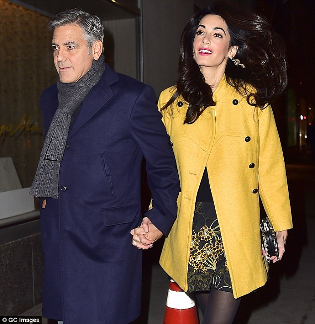 The Clooneys after dinner on March 7.