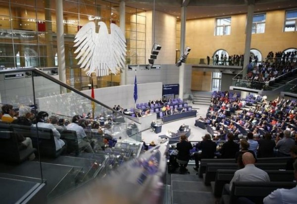 German Finance Minister Wolfgang Schaeuble (C) addresses a session of Germany's parliament, the Bundestag, in Berlin, Germany, August 19, 2015, prior to a vote on Greece's third bailout programme.  REUTERS/Axel Schmidt