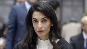 Amal Ramzi Clooney is a London-based Lebanese-British lawyer, activist, and author."The verdict today sends a very dangerous message in Egypt," said Clooney who represented Fahmy. "It sends a message that journalists can be locked up for simply doing their job, for telling the truth and reporting the news. And it sends a dangerous message that there are judges in Egypt who will allow their courts to become instruments of political repression and propaganda."