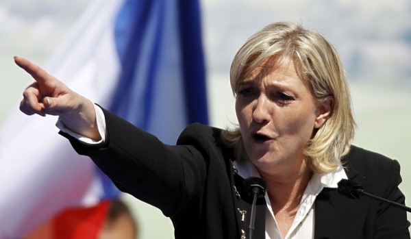 Marine Le Pen,  the French far-right leader  accused Germany   of looking to lower wages and hire "slaves" by opening its doors to thousands of migrants and refugees.