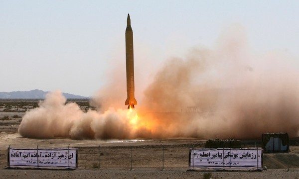 Iran violated a U.N. Security Council resolution in October by test-firing a missile capable of delivering a nuclear warhead, a team of sanctions monitors said, leading to calls in the U.S. Congress on Tuesday for more sanctions on Tehran.
