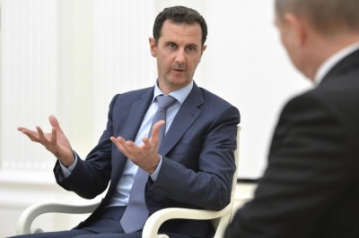 Syrian President Bashar al-Assad meeting with Russian President Vladimir Putin at the Kremlin in Moscow, October 20, 2015. Putin asked Assad to step down as president shortly before the new year. ALEXEI DRUZHININ/RIA NOVOSTI/KREMLIN/REUTERS