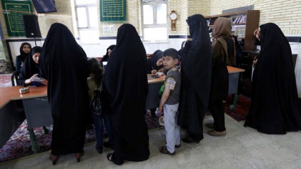 Iranians voting