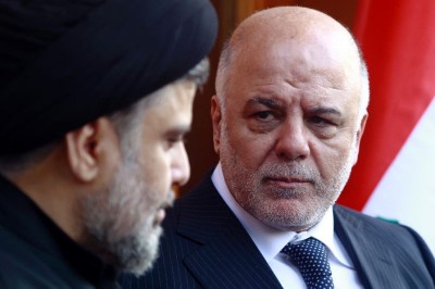 Iraqi Prime Minister Haider al-Abadi, pictured at right with radical Shiite cleric Moqtada al Sadr