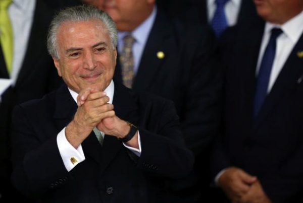 Brazil's interim President Michel Temer gestures during a ceremony where he made his first public remarks after the Brazilian Senate voted to impeach President Dilma Rousseff at the Planalto Palace in Brasilia, Brazil, May 12, 2016. REUTERS/Adriano Machado