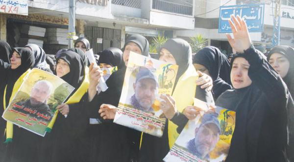 Lebanese Hezbollah supporters mourn the death of their loved ones who were killed recently in Aleppo province Syria while defending the Syria regime 