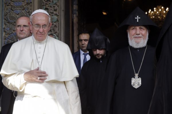 Pope Francis and Catholicos Karekin II leave the Apostolic Cathedral of Etchmiadzin, in Yerevan, Armenia, Friday, June 24, 2016. Pope Francis is in Armenia for a three-day visit. (AP Photo/Andrew Medichini)