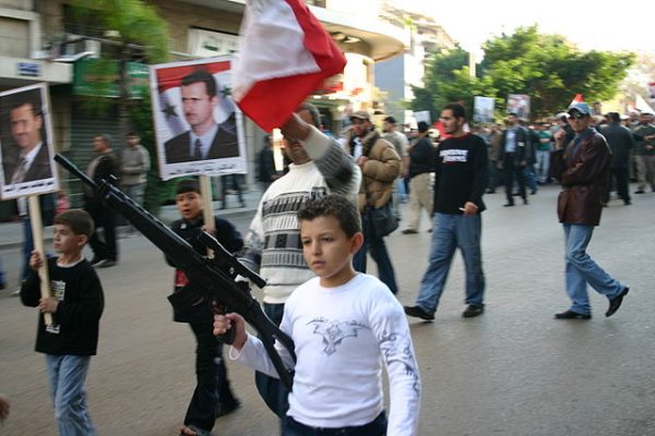 SSNP  supports  demonstrate in favor of the Syrian regime. An SSNP  child soldier was reportedly killed recently in Syria  while fighting to defend Bashar al Assad's regime 