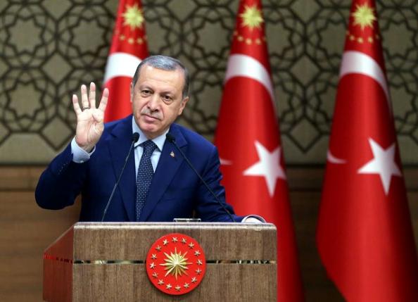 Turkey's President Tayyip Erdogan addresses the audience during a meeting at the Presidential Palace in Ankara, Turkey, August 4, 2016. Murat Cetinmuhurdar/Presidential Palace/Handout via REUTERS
