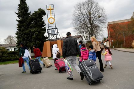 Syrian refugees arrive at the camp for refugees and migrants in Friedland, Germany April 4, 2016. REUTERS/Kai Pfaffenbach