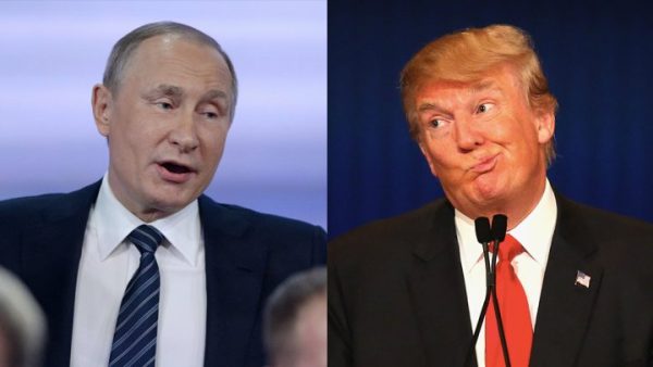 Russian President Vladimir Putin (L) praised   Donald Trump  (R) during his annual press conference in Moscow, on December 17, 2015.  singled him out as an absolute leader.  (AFP Photo/Natalia Kolesnikova)