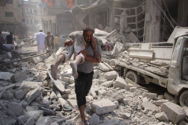 An air strike on a market in Idlib killed up to 60 people while at least 45 died in strikes on Aleppo province, opposition activists say. 