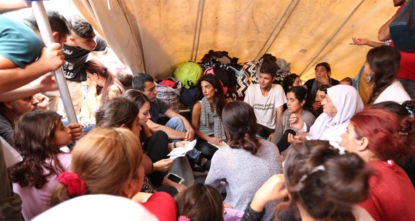Amal Clooney with  Yazidi refugees 