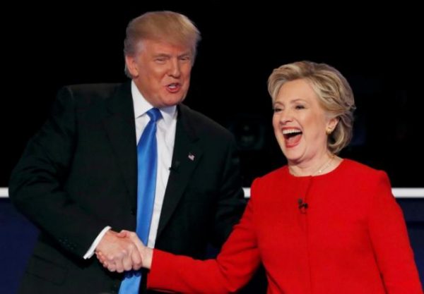 Donald Trump shakes hands with Hillary Clinton at the conclusion of their first presidential debate. REUTERS/Mike Segar