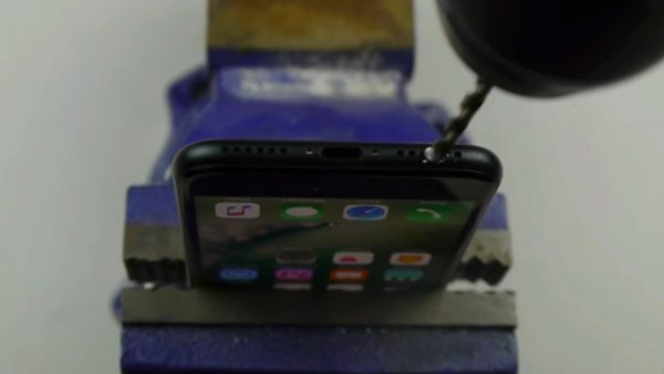 (VIDEO GRABS) iPhone 7 owners tricked into DRILLING hole in their phones for headphones
