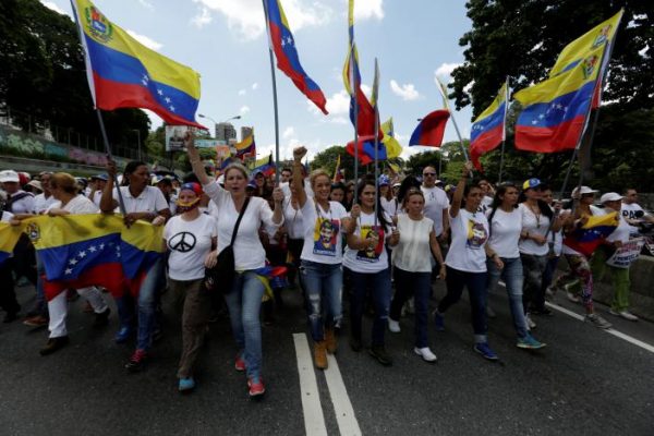 Maduro opponents march after Venezuela referendum sunk