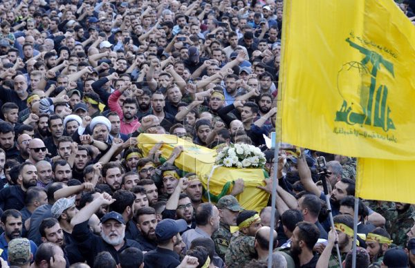  Hezbollah members and supporters carry the coffin of commander Hatem Hamadeh, also known as 'Haj Alaa' during his funeral in the southern suburb of Beirut, Lebanon, 18 October 2016. Hezbollah commander Hatem Hamadeh and Hezbollah fighter al-Effie were killed during clashes in Syria's Aleppo. EPA/WAEL HAMZEH