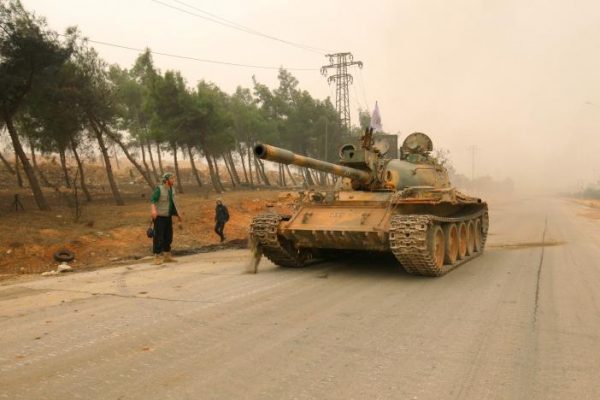 A tank for rebel fighters drives in Dahiyat al-Assad west Aleppo city, Syria October 28, 2016. REUTERS/Ammar Abdullah