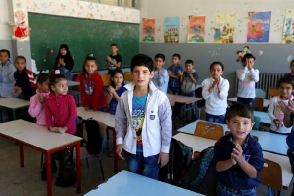 Syrian refugee children attend a class at a school in Mount Lebanon, October 7, 2016. REUTERS/Mohamed Azakir