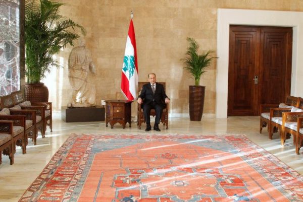Newly elected Lebanese President Michel Aoun sits on the president's chair inside the presidential palace in Baabda, near Beirut, Lebanon October 31, 2016. REUTERS/Aziz Taher