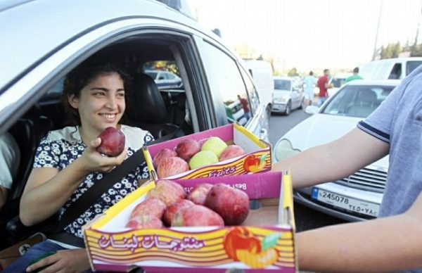 Lebanon witnessed a day of outrage on Tuesday . Many farmers dumped some of their apples on the main highways but In the town of Tarshish in the district of Baabda the farmers chose another way for their protests as they gave apples away to passersby.