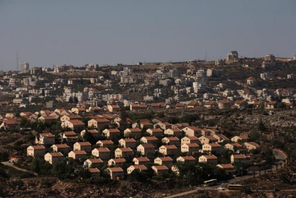 The West Bank Jewish settlement of Ofra is photographed as seen from the Jewish settler outpost of Amona in the occupied West Bank, during an event organised to show support for Amona which was built without Israeli state authorisation and which Israel's high court ruled must be evacuated and demolished by the end of the year as it is built on privately-owned Palestinian land, October 20, 2016. REUTERS/Ronen Zvulun