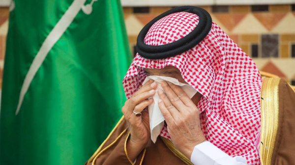 A photo of Saudi Arabia's King Salman bin Abdulaziz Al Saud crying at the funeral procession of his brother Prince Turki bin Abdulziz in Riyadh on November 12,2016
