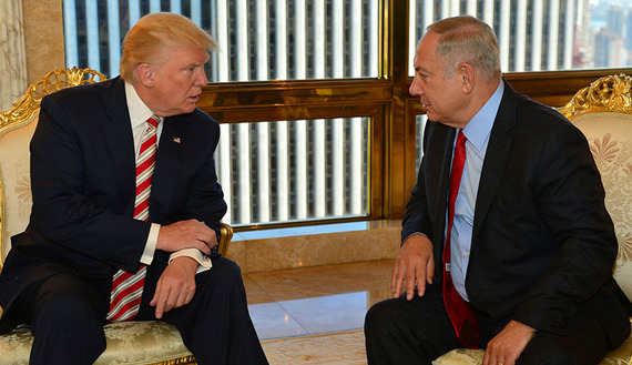 Israeli Prime Minister Benjamin Netanyahu (R) speaks to the then  Republican U.S. presidential candidate Donald Trump during their meeting in New York, September 25, 2016. Kobi Gideon/Government Press Office (GPO)/Handout via REUTERS       ATTENTION EDITORS - THIS IMAGE HAS BEEN SUPPLIED BY A THIRD PARTY. FOR EDITORIAL USE ONLY. - RTX2SIOS