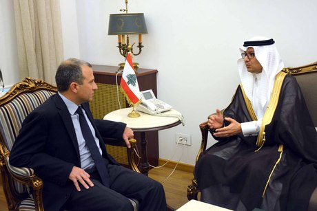 Saudi Charge d'affairs Walid al-Bukhari  is shown with caretaker Foreign Minister Gebran Bassil