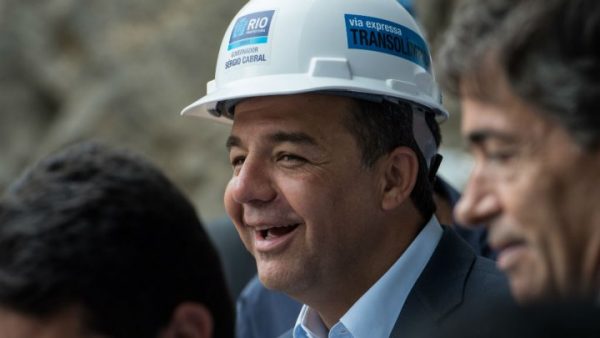 Brazil’s former governor of Rio de Janeiro state Sergio Cabral visits a construction site on November 08, 2013. CREDIT Yasuyoshi Chiba, AFP 