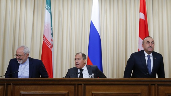 Foreign ministers, Sergei Lavrov (C) of Russia, Mevlut Cavusoglu (R) of Turkey and Mohammad Javad Zarif of Iran, prepare for a news conference in Moscow, December 20th 2016. The 3 will reportedly decide the fate of Syria