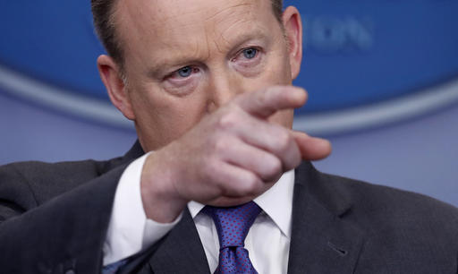 White House press secretary Sean Spicer points to a reporter to take a question during the daily news briefing at the White House in Washington, Monday, Jan. 30, 2017. Spicer discussed the weekend's immigration turmoil and other topics. (AP Photo/Carolyn Kaster)