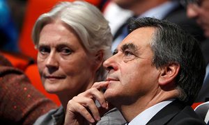 François Fillon, pictured at a rally with his wife, Penelope