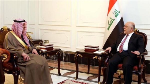 Saudi Foreign Minister Adel Al-Jubeir  is shown with  Iraqi Prime Minister Haider al-Abadi 