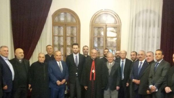 Greek Catholic Bishop of Sidon and Deir al-Qamar Elie Haddad  is shown with Taymur Jumblat , Minister Marwan Hemdeh and a PSP delegation.